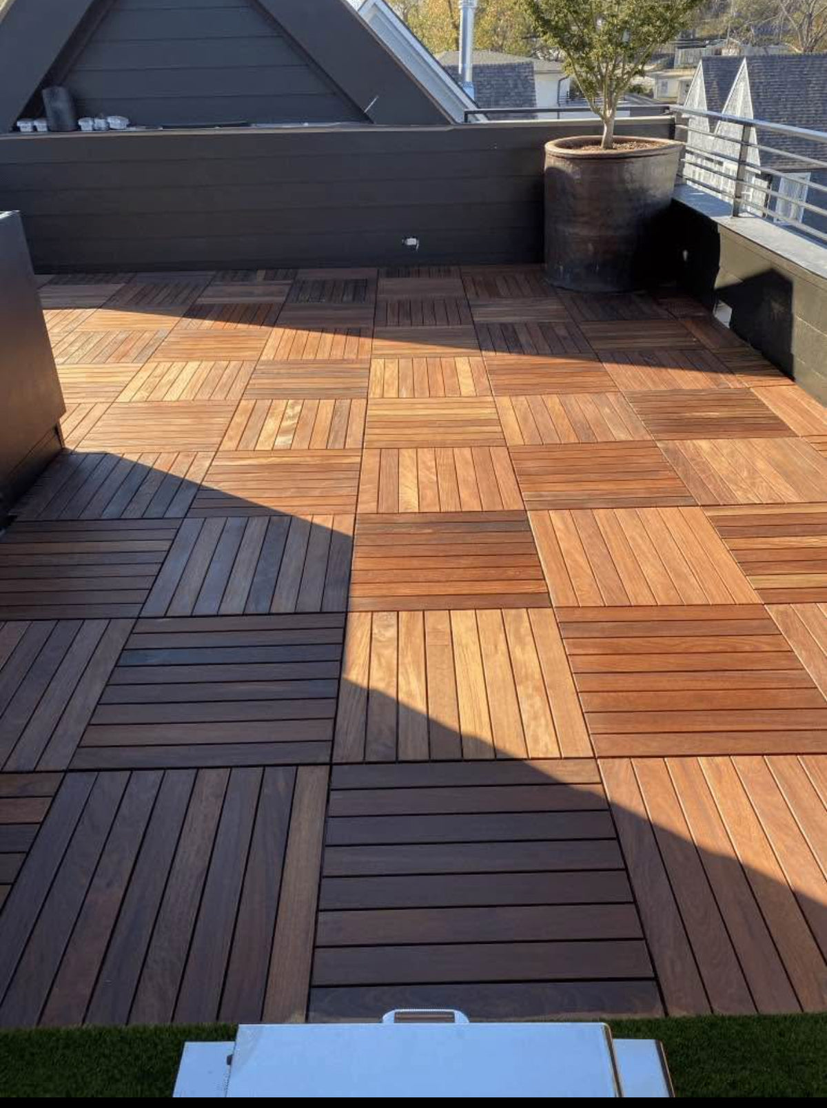 Kempas hardwood deck tile showing the interlocking base frame